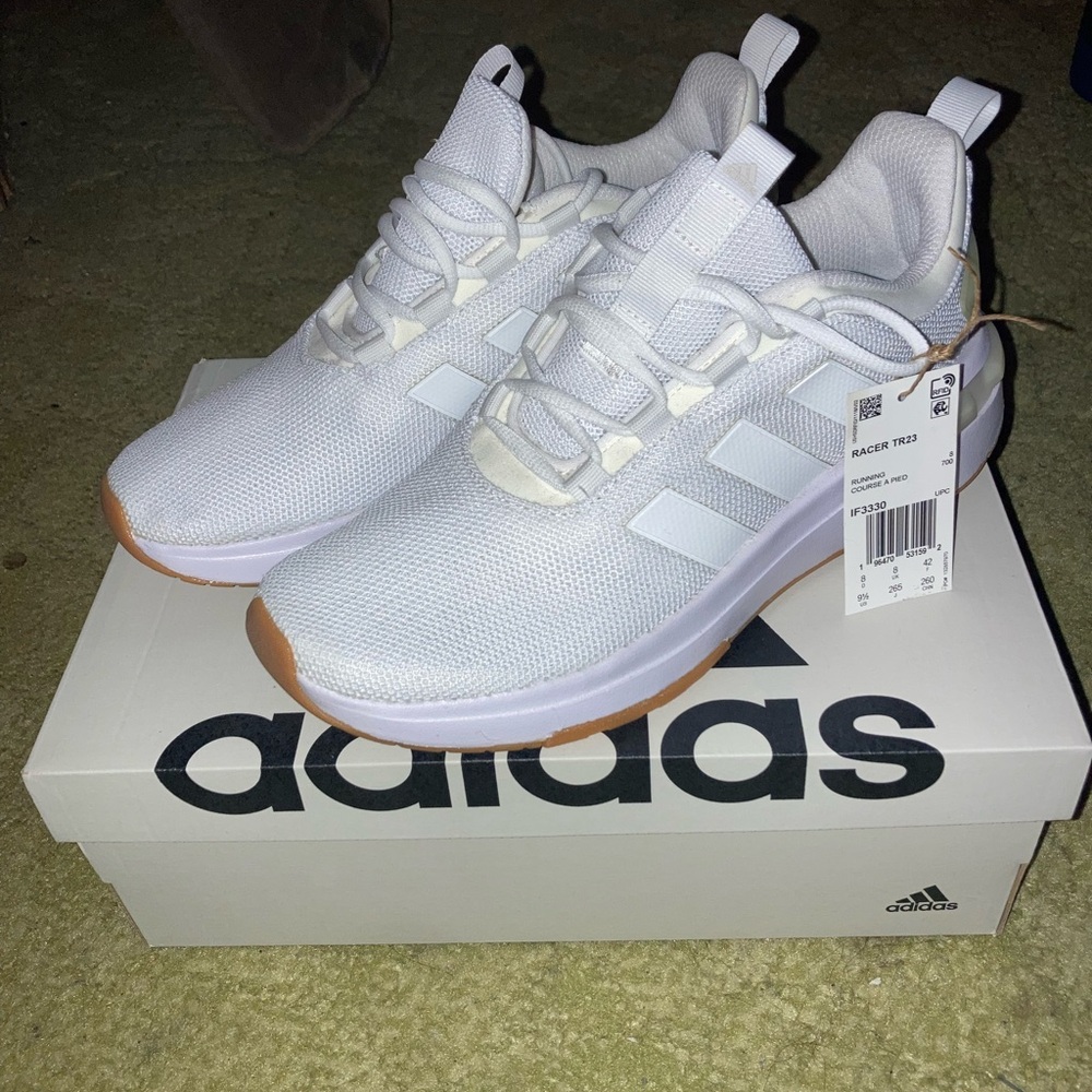 Adidas running shoes, white 9.5 Women. New with tags and box. Never been worn.